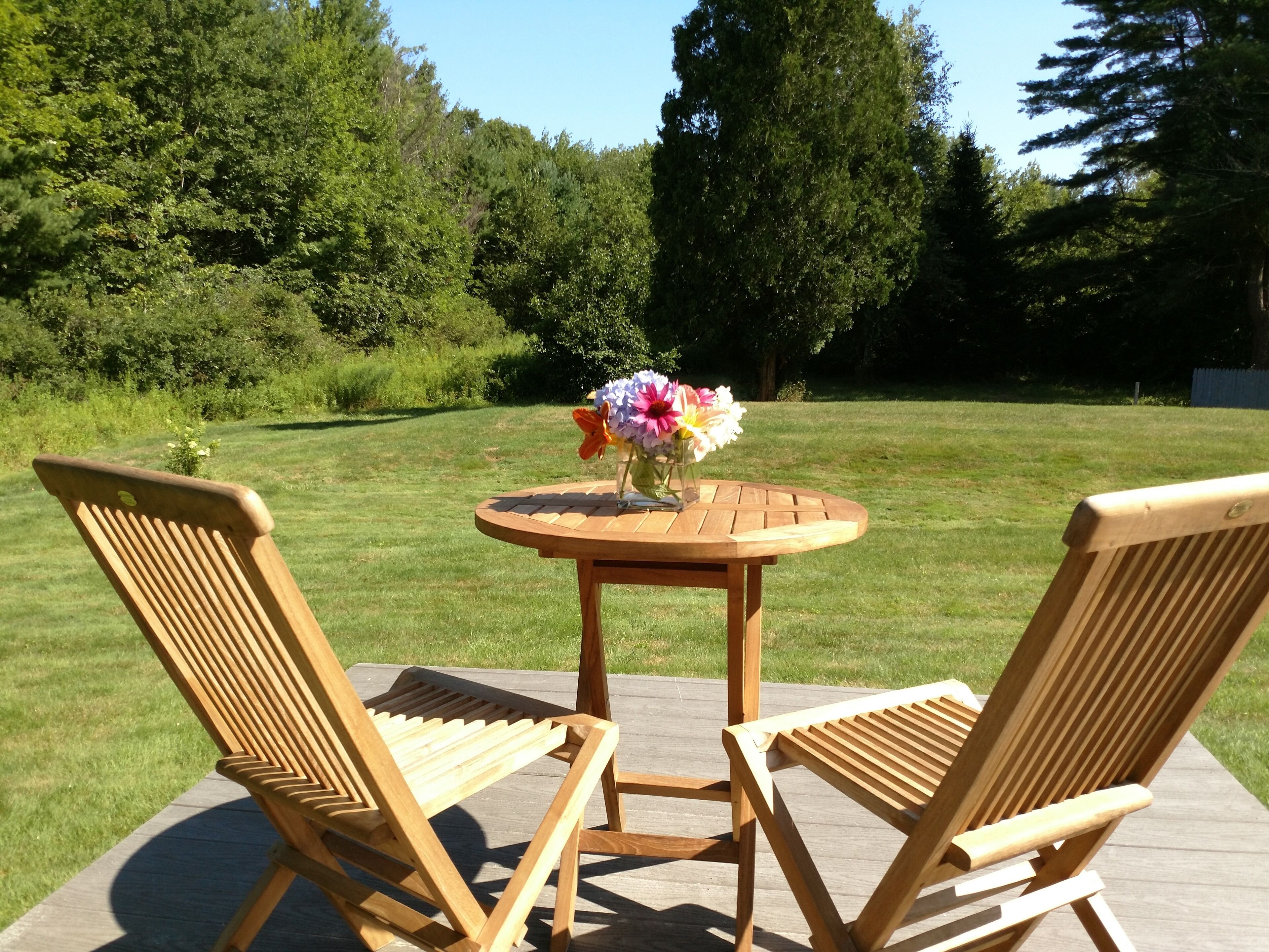 Private back deck overlooking the lawn.