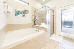Bathtub, hair dryer, towels, soap