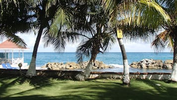 On the beach, sun loungers, beach towels