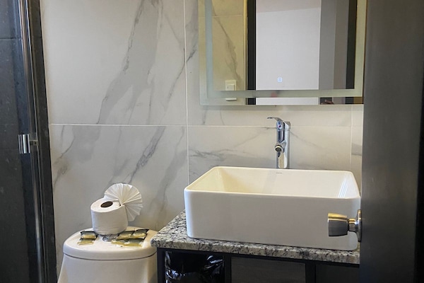 Standard Double Room, 2 Queen Beds, Private Bathroom | Bathroom | Shower, free toiletries, towels, soap