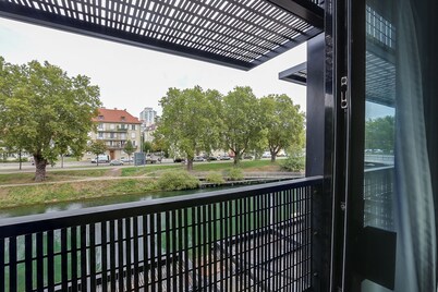 My apartment is located on the peninsula malraux in a new building.
