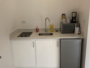 Mini-fridge, microwave, stovetop, electric kettle