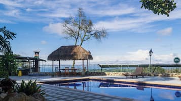 Outdoor pool, open 8:00 AM to 10:00 PM, free pool cabanas, pool loungers