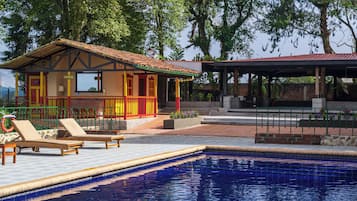 Outdoor pool, open 8:00 AM to 10:00 PM, free pool cabanas, pool loungers