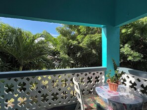 Outdoor dining - Comfy 2- bedroom apartment on Barbados' South Coast, near beach and attractions! (Oistins)