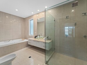 Bathtub, hair dryer, towels