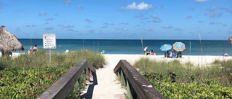 On the beach, sun loungers, beach towels