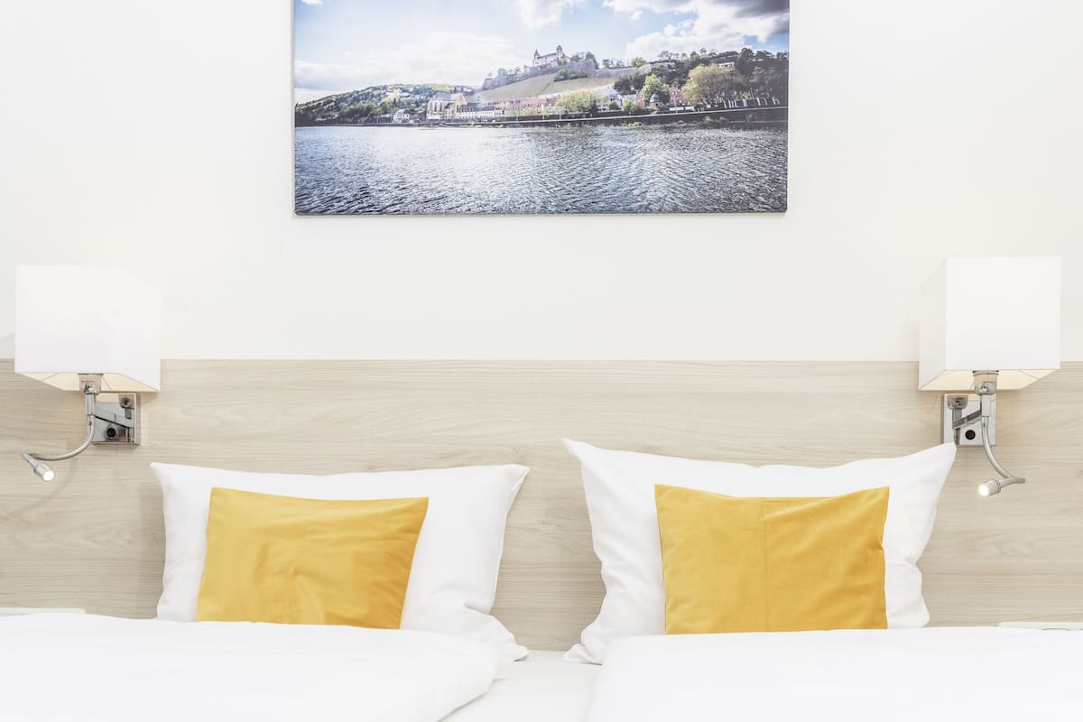 deluxe double room | hypo-allergenic bedding, desk, laptop workspace, soundproofing