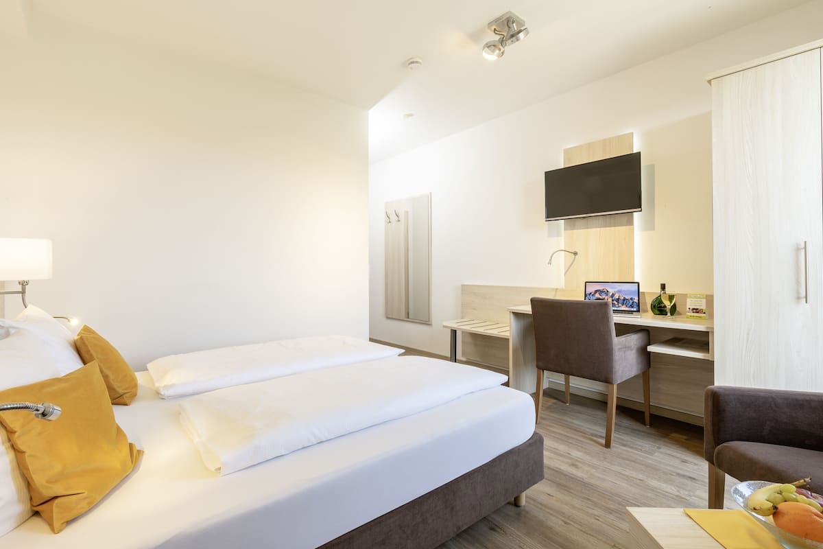 deluxe double room | hypo-allergenic bedding, desk, laptop workspace, soundproofing