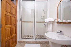 Apartment, 3 Bedrooms | Bathroom | Shower, free toiletries, slippers, towels - Caran Hotel Apartments (Kampala)