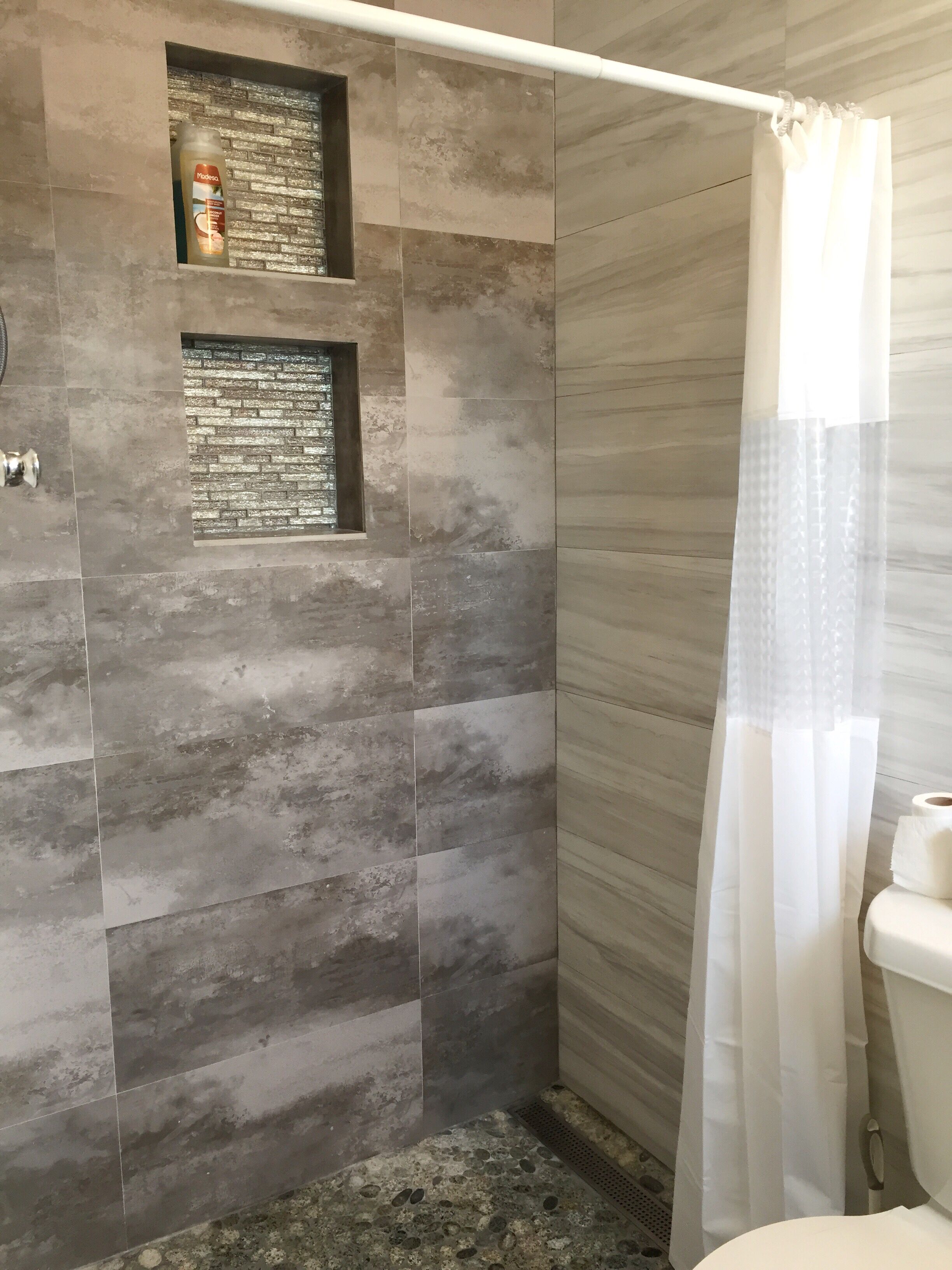 Shower, eco-friendly toiletries, hair dryer, towels