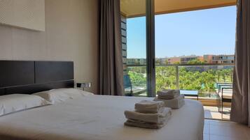 1 bedroom, premium bedding, blackout drapes, iron/ironing board