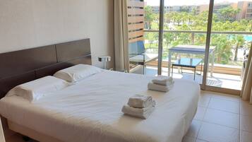 Deluxe Apartment, 1 Bedroom | Premium bedding, blackout drapes, iron/ironing board