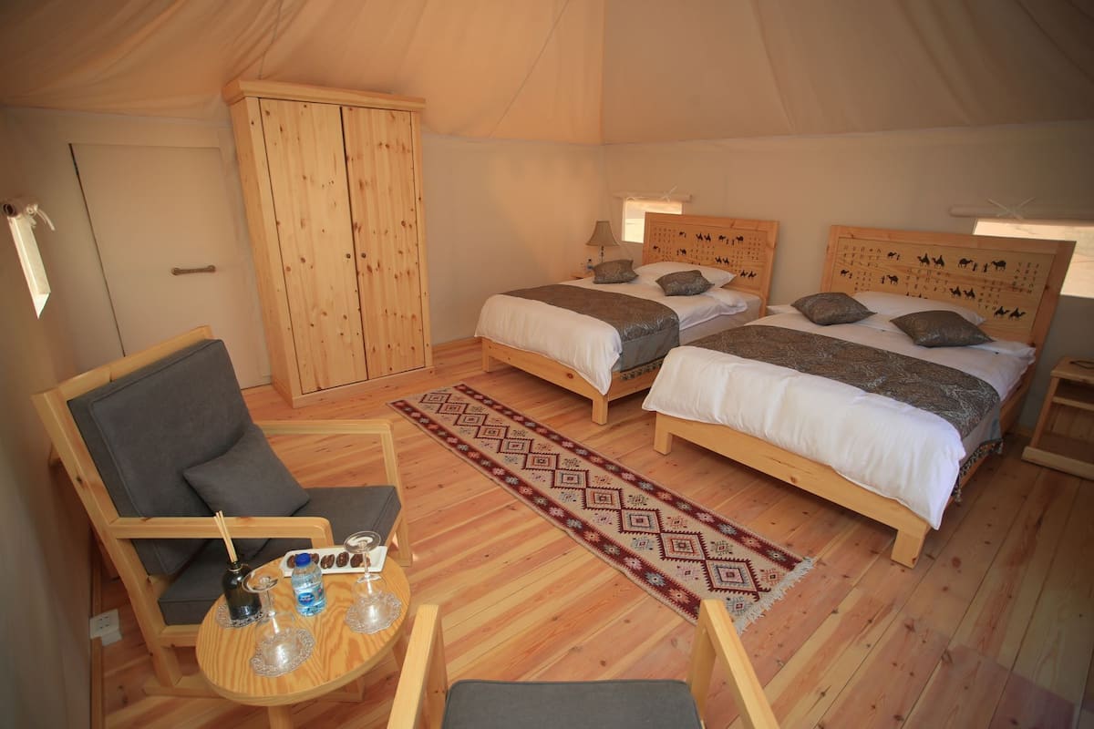 Luxury Tent | Egyptian cotton sheets, premium bedding, down comforters