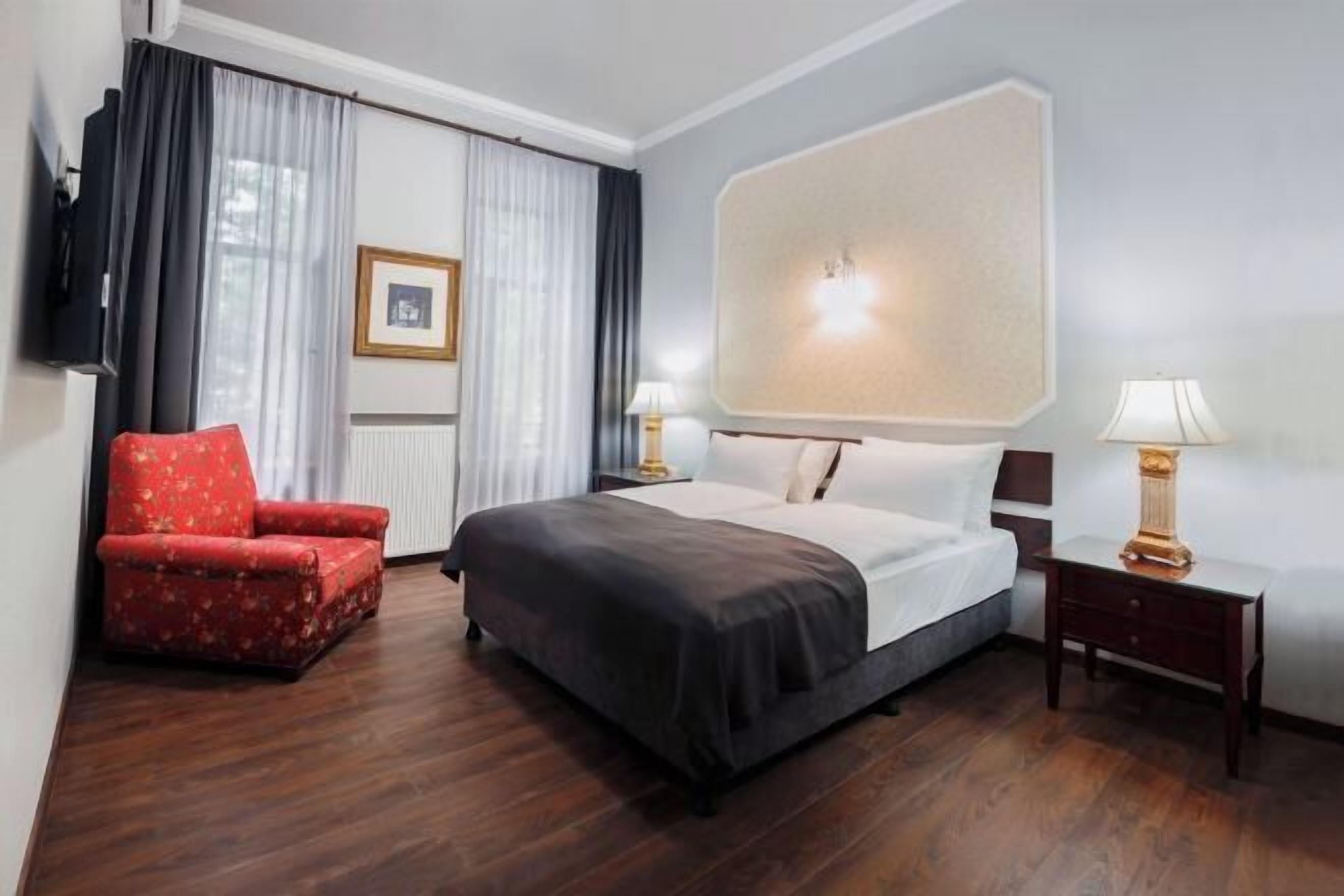 Premium bedding, desk, laptop workspace, soundproofing