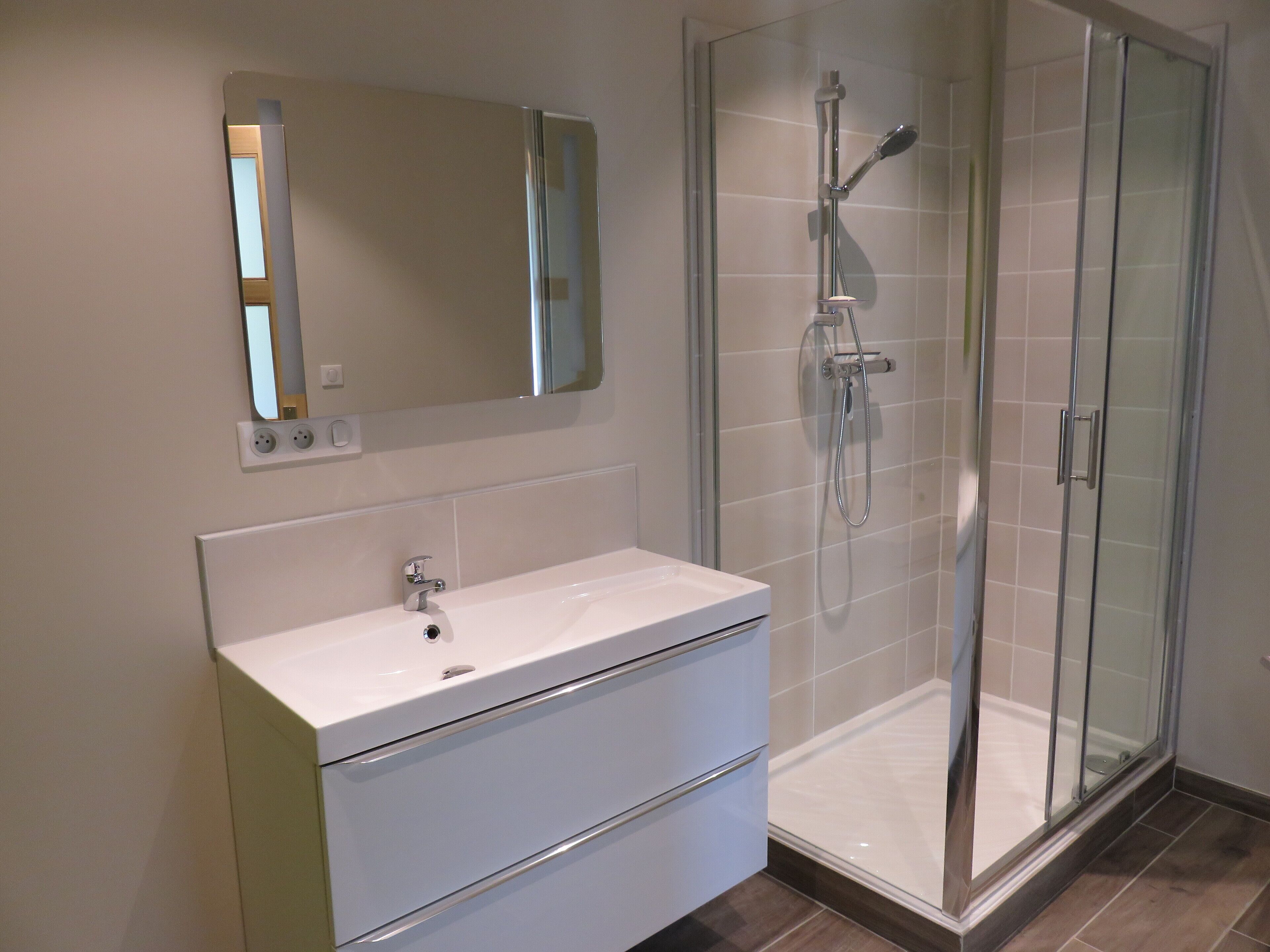 Shower, hair dryer, towels, toilet paper