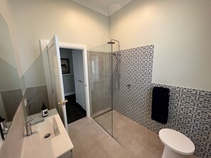 Shower, shampoo, toilet paper