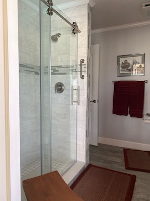 Bathtub, hair dryer, towels, soap