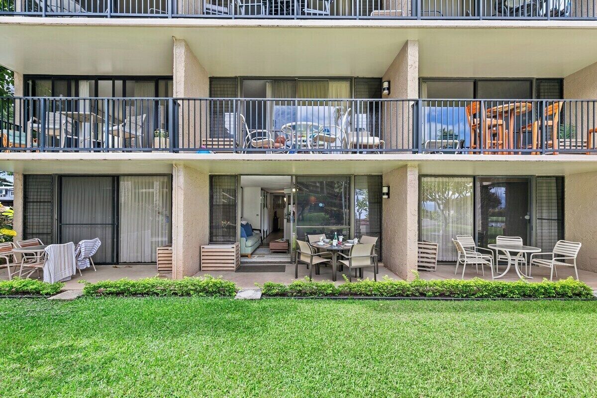 Stay in a resort with balconies overlooking lawns.
