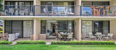 Stay in a resort with balconies overlooking lawns.