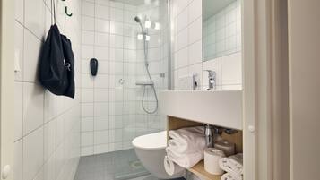 Shower, eco-friendly toiletries, hair dryer, bidet