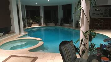 Indoor pool, open 8:00 AM to 10:00 PM, pool umbrellas, sun loungers