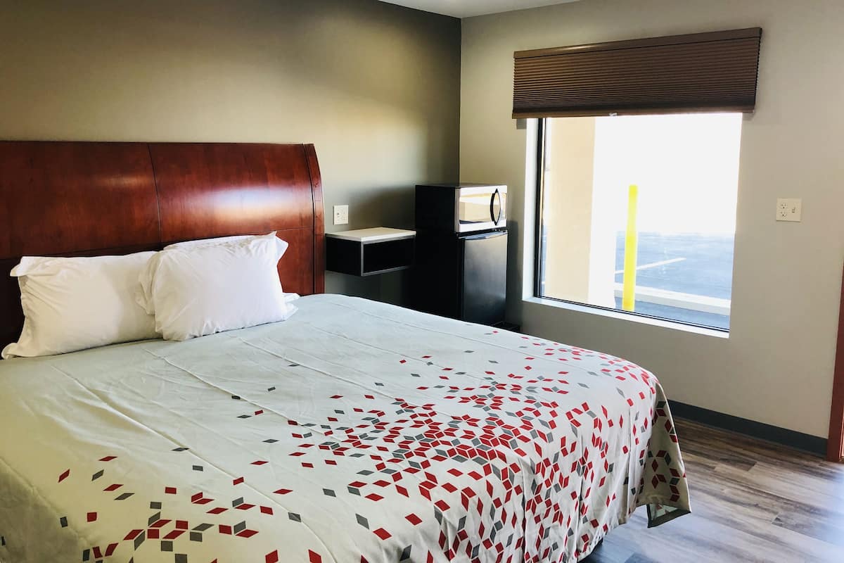 Blackout curtains, iron/ironing board, free WiFi, bed sheets