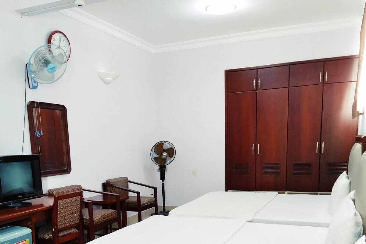 Desk, laptop workspace, blackout curtains, soundproofing