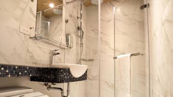 Shower, free toiletries, hair dryer, slippers