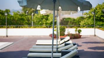 Seasonal outdoor pool, pool umbrellas, pool loungers