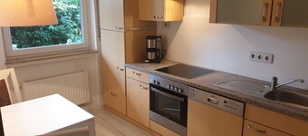 Andina's apartment, central and right on the forest