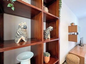 Apartment, Multiple Beds (2 Bedrooms) | Living area | 65-inch TV with cable channels