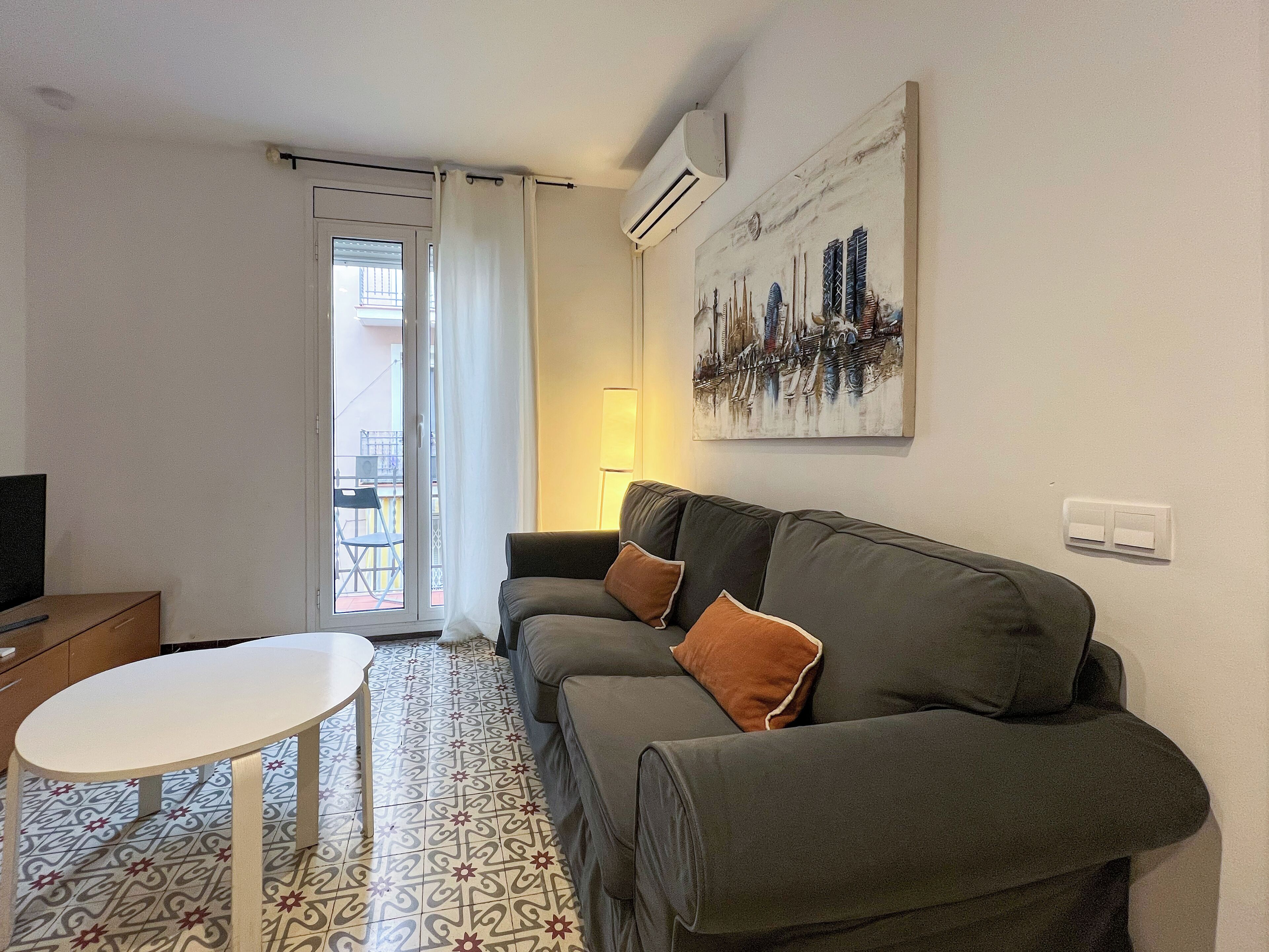 Appartement, Meerdere bedden (2 Bedrooms) | Woonruimte | Een 65-inch televisie met kabelzenders