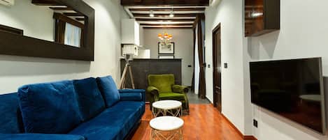 Apartment (2 Bedrooms) | Living area | 65-inch TV with cable channels