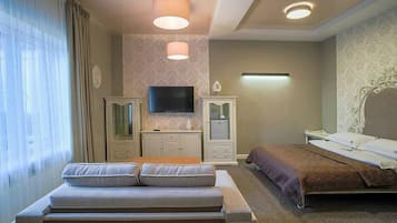 Junior Double Room | Minibar, in-room safe, iron/ironing board, free WiFi