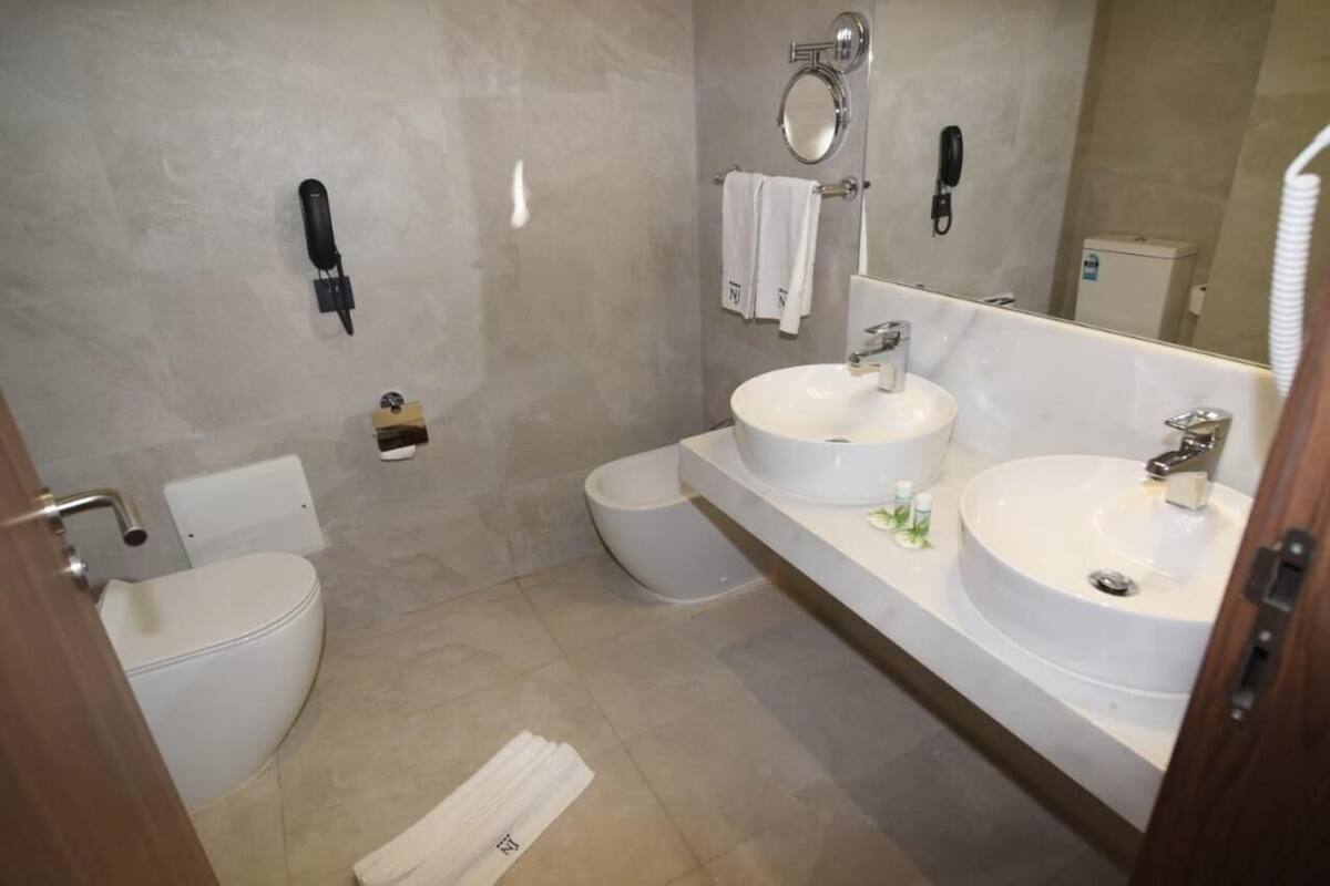 free toiletries, hair dryer, slippers, towels