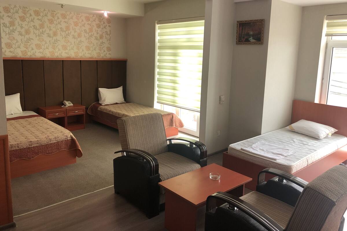 Family Quadruple Room | Minibar, in-room safe, desk, blackout curtains