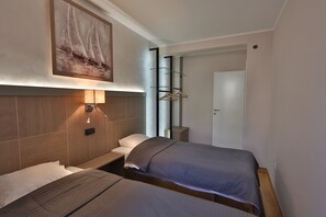 Apartment, 2 Schlafzimmer | 2 Schlafzimmer, Bügeleisen/Bügelbrett, kostenloses WLAN, Bettwäsche