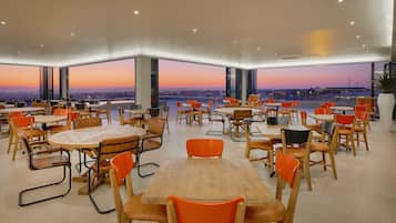 Breakfast, lunch, dinner served; local and international cuisine