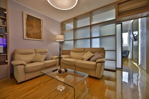 Lägenhet - 2 sovrum | Vardagsrum | Platt-tv