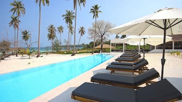 Outdoor pool, open 7:00 AM to 11:00 PM, pool umbrellas, sun loungers