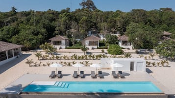 Outdoor pool, open 7:00 AM to 11:00 PM, pool umbrellas, pool loungers