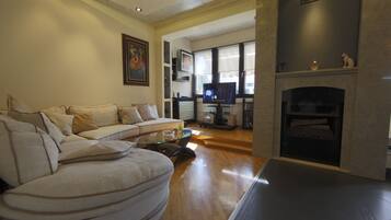 Luxury Apartment, 2 Bedrooms | Living area | Flat-screen TV, DVD player