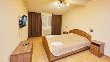 1 chambre, minibar, bureau, fer et planche à repasser