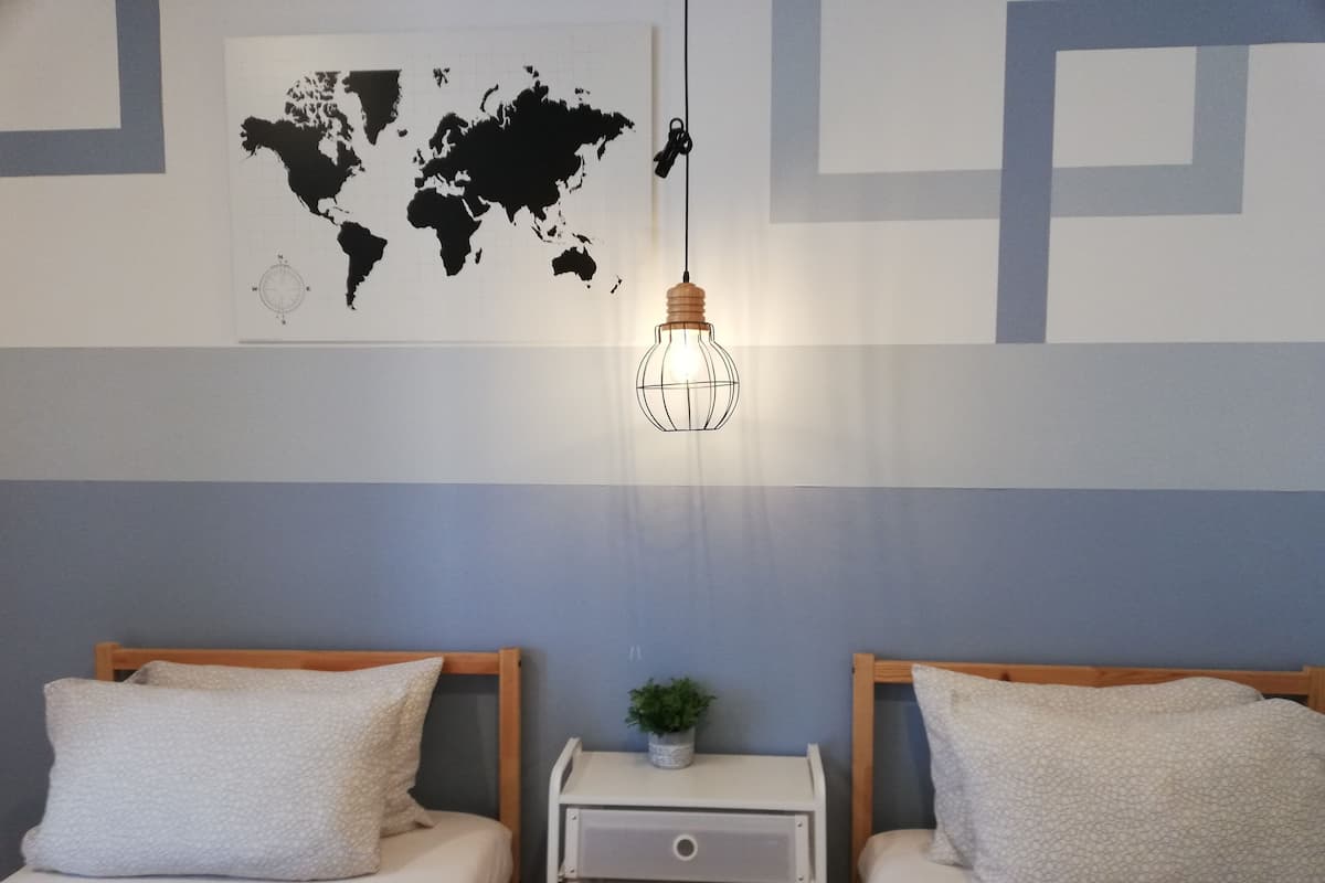 2 bedrooms, blackout curtains, iron/ironing board, bed sheets