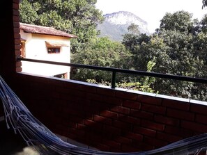 Quarto E | Balcony view - Pousada Casa Da Trilha (Palmeiras)