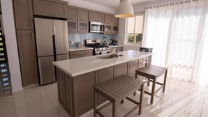 A modern kitchen with a central island, stainless steel appliances, and wooden cabinets. - Private 3 Bedroom Villa Near Walking Trail (Sosúa)