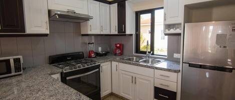 Villa (2 Bedrooms) | Private kitchen | Oven, stovetop, espresso maker, cookware/dishes/utensils