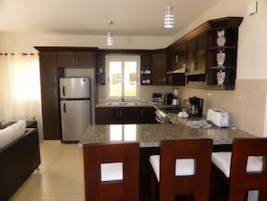 Vila (3 Bedrooms) | Cozinha privada | Fogão, cooktop, máquina de café expresso