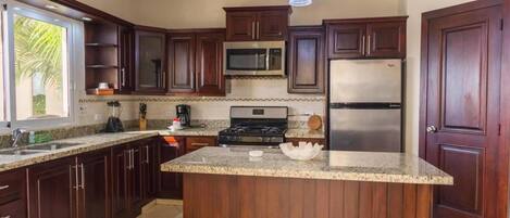Villa (3 Bedrooms) | Private kitchen | Oven, stovetop, espresso maker, cookware/dishes/utensils